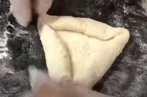 Doblez tres puntas Técnica de doblez para formar el pan tres puntas arequipeño
